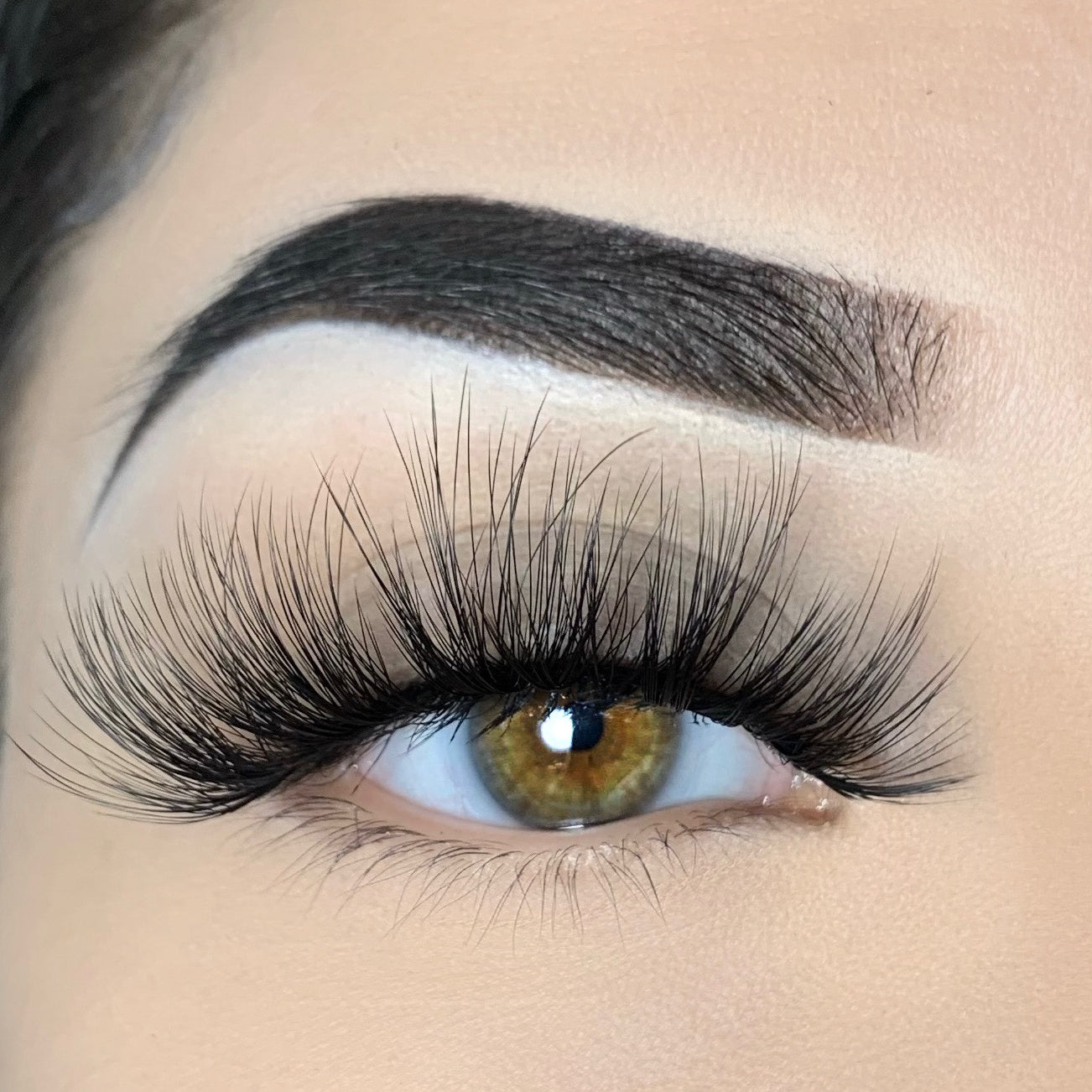 Model wearing Nesha lashes